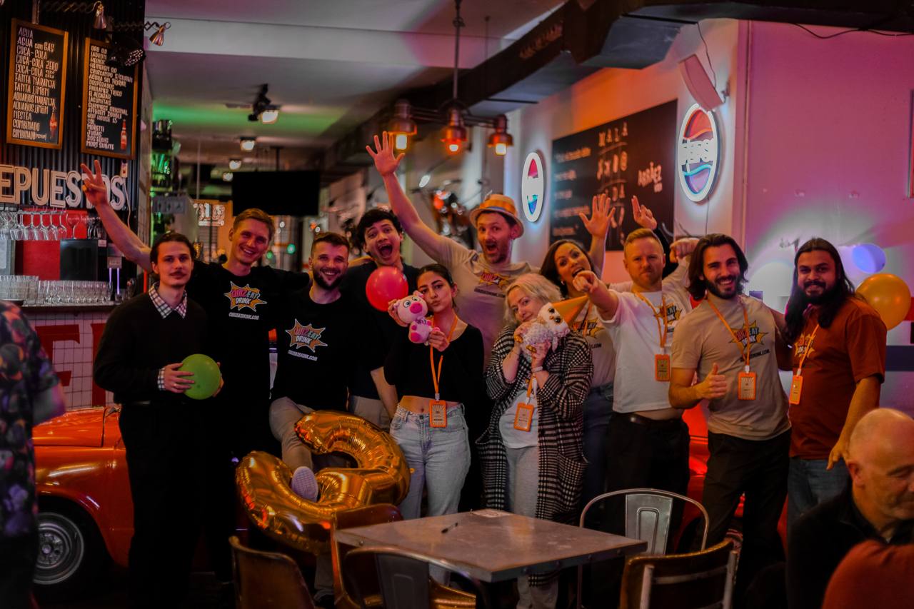 The Quiz Eat Drink team celebrating a trivia night in Valencia